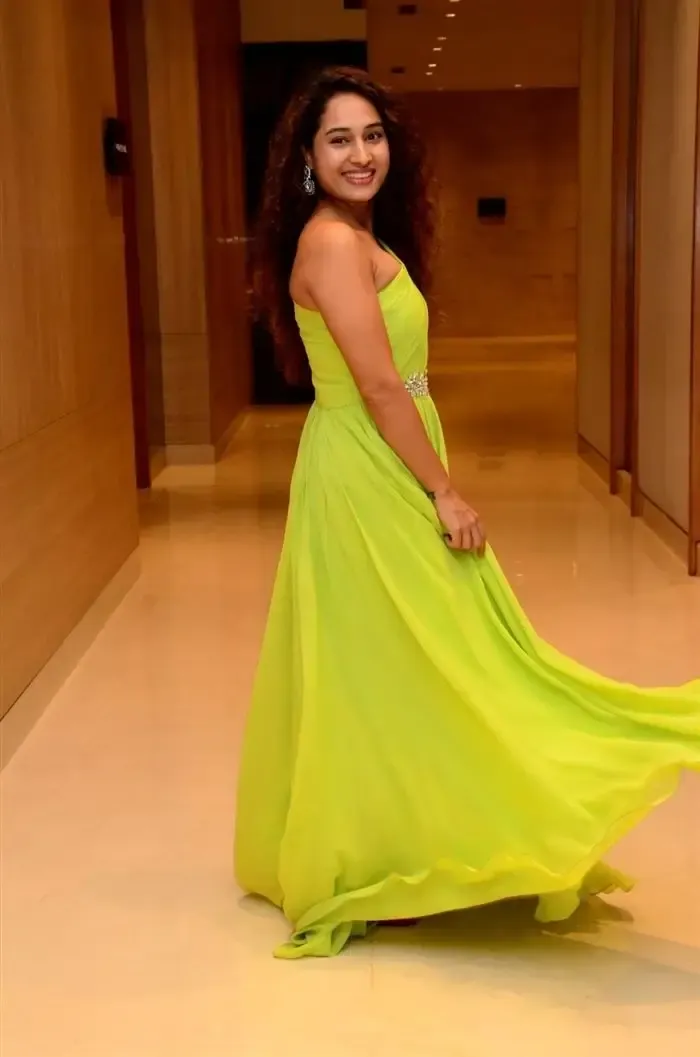 Indian Actress Pooja Ramachandran Images in Long Green Gown